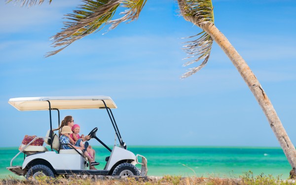 Exploring Puerto Aventuras in a golf cart – Agave Villas