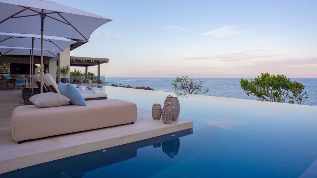 Poolside seating at Casa Tesoro in Punta Mita