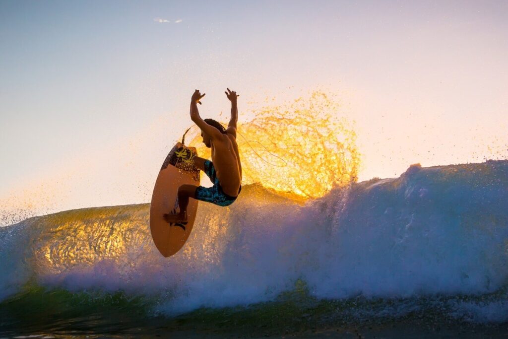 Surfer ride on surfboard at ocean wave