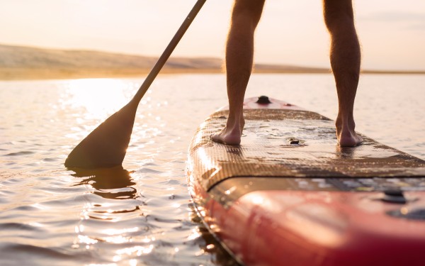 Paddleboarding in the clear waters of Puerto Aventuras - Agave Villa