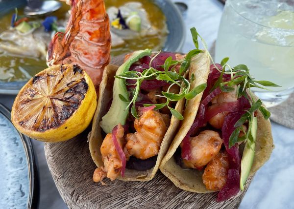 Fresh seafood tacos with grilled shrimp and avocado in Puerto Los Cabos